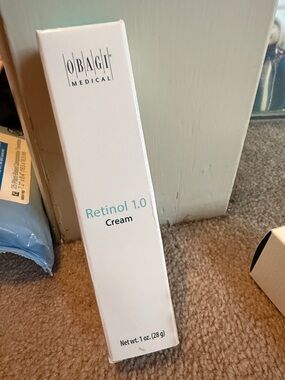 Obagi Retinol 1.0 Cream White with Teal Text